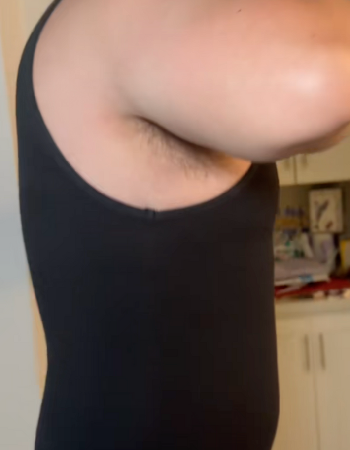 Miguel wearing the Somnea tank top