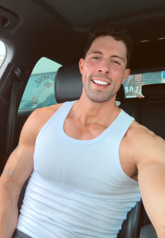Adam wearing the Somnea tank top